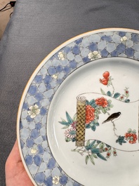 A Chinese famille rose ruby-back plate with a bird on a blossoming branch, Yongzheng