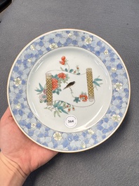 A Chinese famille rose ruby-back plate with a bird on a blossoming branch, Yongzheng
