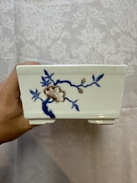 A Chinese blue, white and copper-red rectangular jardini&egrave;re with birds among flowering branches, 20th C.
