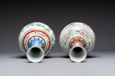 A pair of Chinese famille rose 'Playing Boys' vases, an 'Antiquities' vase and a vase with narrative design, Qianlong marks, 20th C.