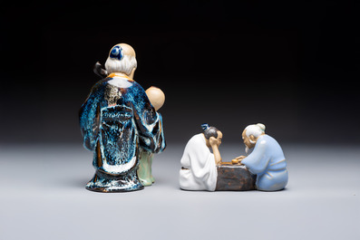 A Chinese polychrome-glazed Shiwan stoneware figure of Tudigong, a 'Shoulao' group and a 'Go Players' group, China marks, 19/20th C.