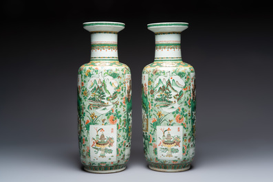 An impressive and fine pair of large Chinese famille verte 'Fishermen and Antiquities' rouleau vases, seal marks, Kangxi