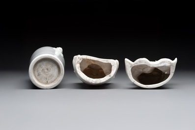 Two Chinese Dehua blanc de Chine groups of Guanyin and a vase with lion-head handles, 18th C. and later