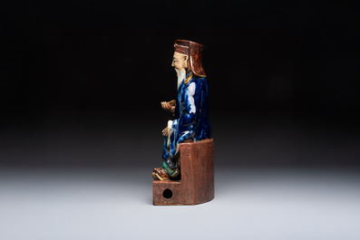 A Chinese polychrome-glazed Shiwan stoneware figure of Tudigong, a 'Shoulao' group and a 'Go Players' group, China marks, 19/20th C.
