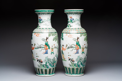 A pair of Chinese famille verte 'Elegant Beauties and Playing Boys' vases, 20th C.