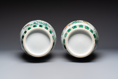 A pair of Chinese famille verte 'Elegant Beauties and Playing Boys' vases, 20th C.