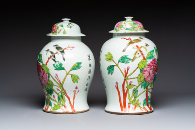 Two Chinese famille rose 'Birds among Flowering Branches' covered vases and a covered jar, 19/20th C.