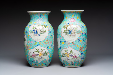 A pair of Chinese famille rose 'Playing Boys' vases, an 'Antiquities' vase and a vase with narrative design, Qianlong marks, 20th C.