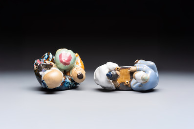 A Chinese polychrome-glazed Shiwan stoneware figure of Tudigong, a 'Shoulao' group and a 'Go Players' group, China marks, 19/20th C.