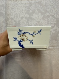 A Chinese blue, white and copper-red rectangular jardini&egrave;re with birds among flowering branches, 20th C.