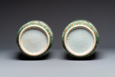 An impressive and fine pair of large Chinese famille verte 'Fishermen and Antiquities' rouleau vases, seal marks, Kangxi