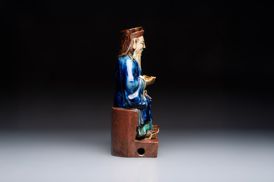 A Chinese polychrome-glazed Shiwan stoneware figure of Tudigong, a 'Shoulao' group and a 'Go Players' group, China marks, 19/20th C.