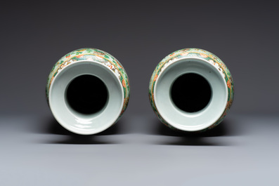 An impressive and fine pair of large Chinese famille verte 'Fishermen and Antiquities' rouleau vases, seal marks, Kangxi