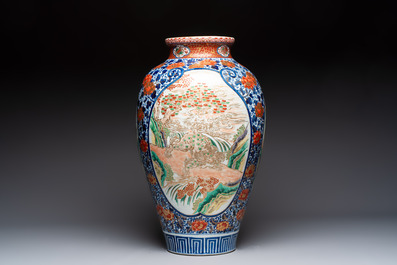A large Japanese Imari 'Shishi Lions' vase, Kutani Taniguchi 九谷 谷口 mark, Meiji, 19th C.
