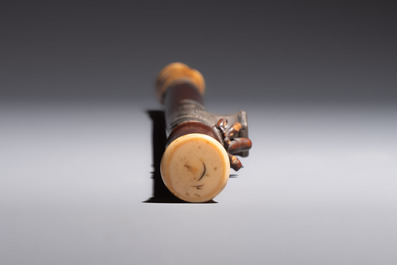 A Chinese enamelled Yixing stoneware teapot, a pewter container, a horn cup, a bamboo brush pot, and an opium pipe, Wan Shun 萬順 mark, 19/20th C.