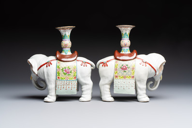 A pair of Chinese famille rose elephants carrying a 'Gu' vase and three sancai-glazed immortals, 20th C.