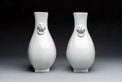 A pair of Chinese white-glazed 'Hu' vases and a Longquan celadon 'Twin Fish' plate, 20th C.