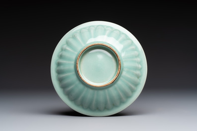 A pair of Chinese white-glazed 'Hu' vases and a Longquan celadon 'Twin Fish' plate, 20th C.