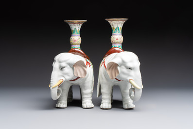 A pair of Chinese famille rose elephants carrying a 'Gu' vase and three sancai-glazed immortals, 20th C.
