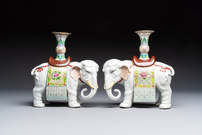 A pair of Chinese famille rose elephants carrying a 'Gu' vase and three sancai-glazed immortals, 20th C.