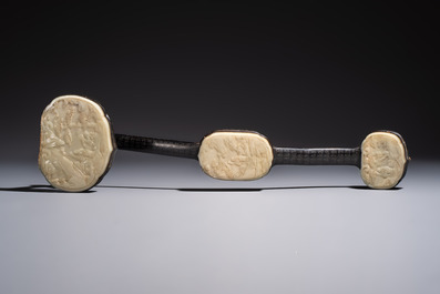 A pair of Chinese jade-inset wooden table screens, a jade-inset wooden ruyi with its original stand and a jade 'bi' disc on a wooden stand, 19/20th C.