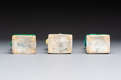 A pair of Chinese famille rose elephants carrying a 'Gu' vase and three sancai-glazed immortals, 20th C.