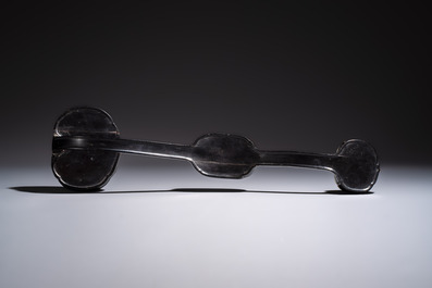 A pair of Chinese jade-inset wooden table screens, a jade-inset wooden ruyi with its original stand and a jade 'bi' disc on a wooden stand, 19/20th C.