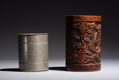 A Chinese enamelled Yixing stoneware teapot, a pewter container, a horn cup, a bamboo brush pot, and an opium pipe, Wan Shun 萬順 mark, 19/20th C.