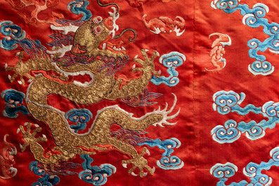 Two Chinese embroidered silk children's robes, 19th C.