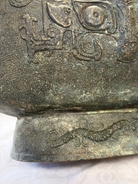 A rare and large Chinese archaistic bronze pouring vessel and cover, Gong 觥, Qing