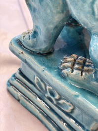 A pair of Chinese turquoise-glazed Buddhist lions, a pair of green-glazed parrots and a pair of miniature garden seats, 19/20th C.
