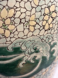 A Chinese verte biscuit 'Dragon Gate Carp 鯉躍龍門' vase on a wooden stand, Xuande mark, 19th C.