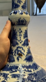 A rare Chinese blue and white bottle vase with narrative design, Transitional period