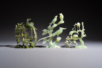 Five Chinese hardstone carvings, four with wooden stands, 20th C.
