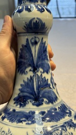 A rare Chinese blue and white bottle vase with narrative design, Transitional period