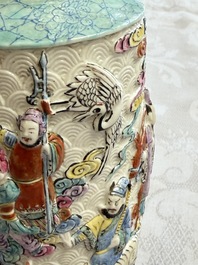 A pair of Chinese famille rose relief-moulded 'Immortals' vases, Qianlong mark, Republic