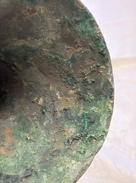A Chinese archaic bronze wine vessel with Taotie design, Gu 觚, Shang