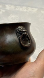 A Chinese bronze censer with lion-head handles and relief dragon design, Lu Gu Zhai 侶古齋 mark, 18/19th C.