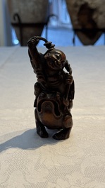 A small Chinese carved bamboo group of 'Liuhai', 19th C.