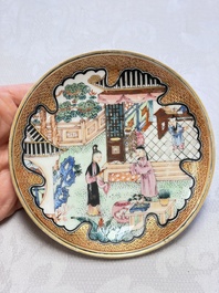 A fine Chinese Canton famille rose cup and saucer with figural design, Yongzheng/Qianlong
