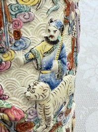 A pair of Chinese famille rose relief-moulded 'Immortals' vases, Qianlong mark, Republic
