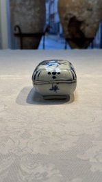 A Chinese blue and white betel nut box and cover with floral design, Wanli