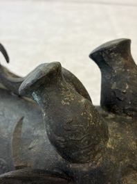 A rare and large Chinese archaistic bronze pouring vessel and cover, Gong 觥, Qing