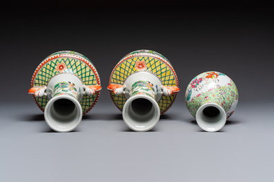 Five Chinese famille rose and verte vases and an armorial ewer, various marks, 20th C.
