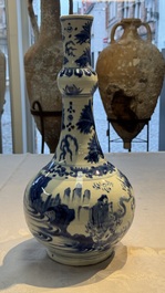 A rare Chinese blue and white bottle vase with narrative design, Transitional period