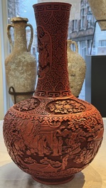 A pair of Chinese cinnabar lacquer 'Xi Xiang Ji' 'Tianqiu Ping' vases, 20th C.