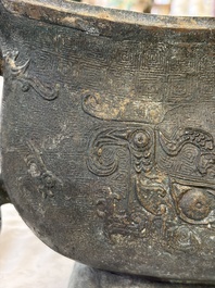A rare and large Chinese archaistic bronze pouring vessel and cover, Gong 觥, Qing