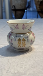 A Chinese famille rose 'Butterflies' spittoon, Tongzhi mark and of the period