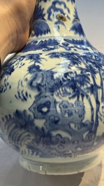 A rare Chinese blue and white bottle vase with narrative design, Transitional period