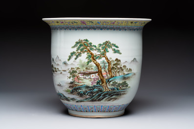 A Chinese famille rose 'Mountainous Landscape' jardiniere with a stand and a pair of vases with floral design, Qianlong marks, 20th C.